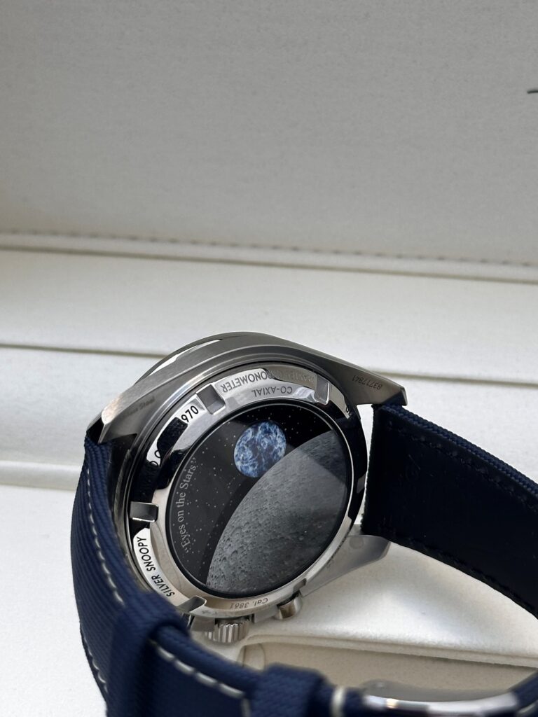 Case back of Snoopy on Omega Speedmaster