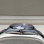 Crown of Rolex Oyster Perpetual with Lavender dial