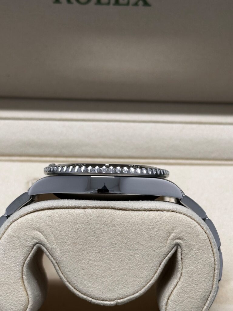 Rolex submariner date black dial side view
