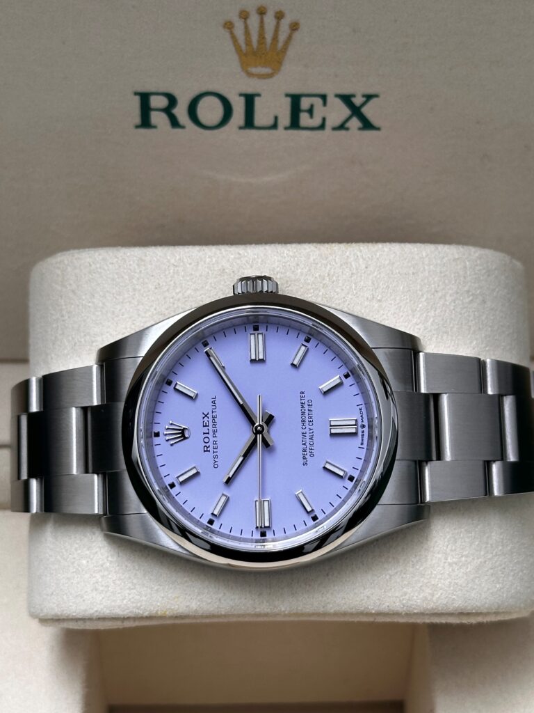 Close up of Rolex Oyster Perpetual in Rolex box with Lavender dial