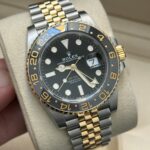Rolex GMT Master II 126713GRNR on wrist two tone