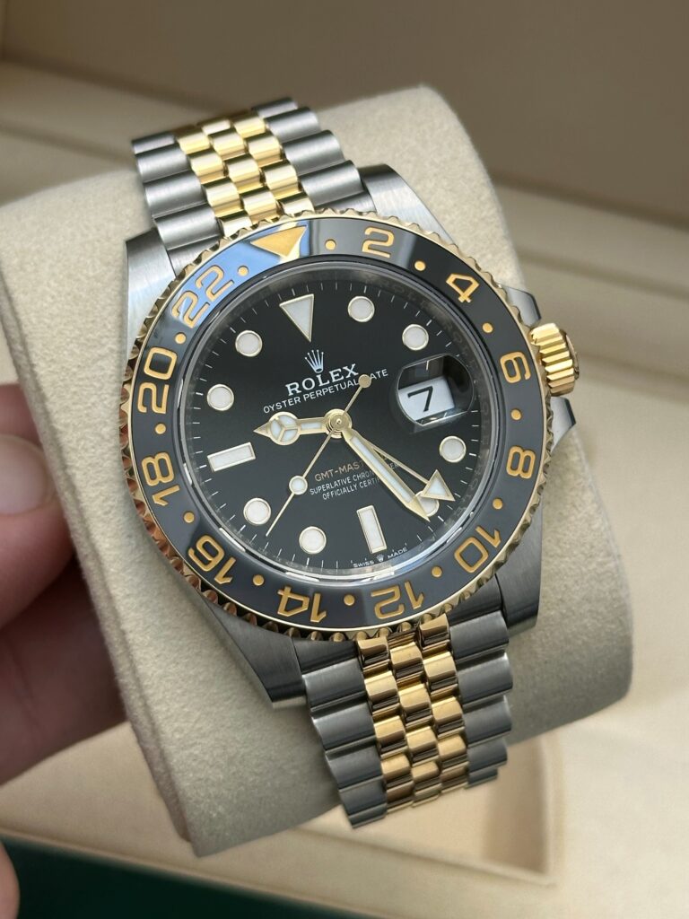 Rolex GMT Master II 126713GRNR on wrist two tone