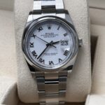 Rolex Datejust 126200 white dial detail