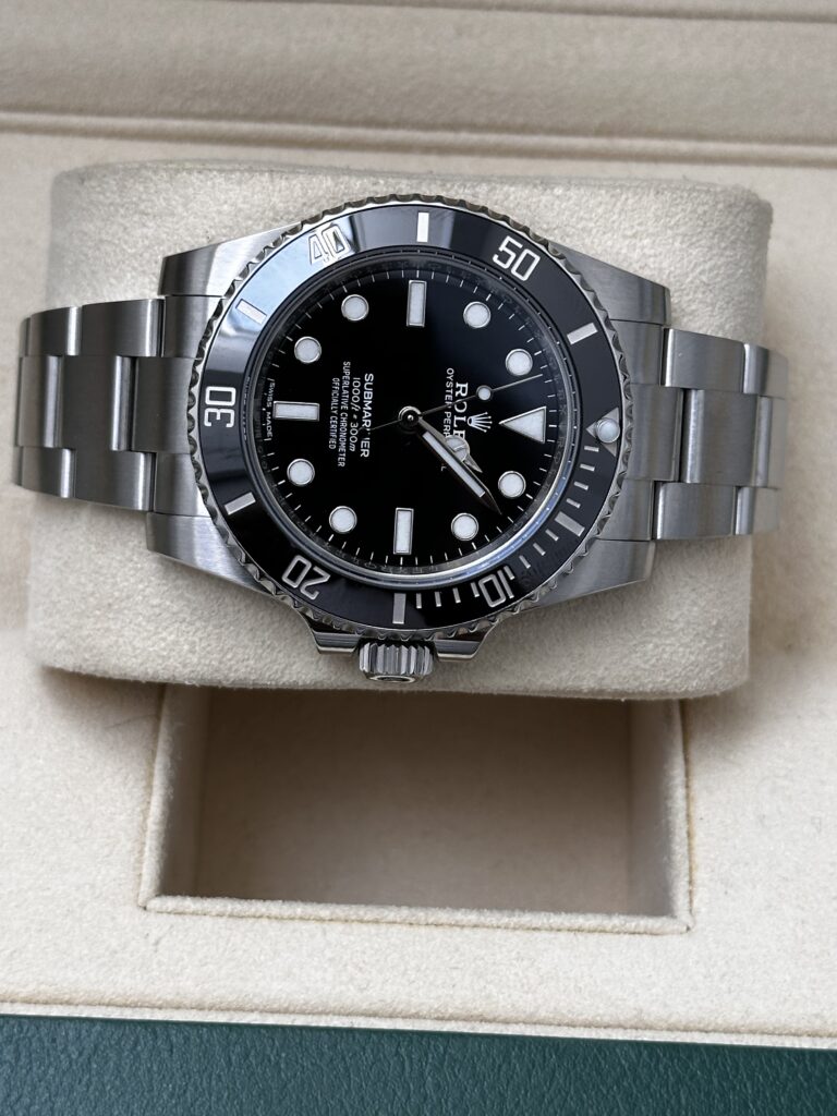 Rolex Submariner 114060 black dial close up