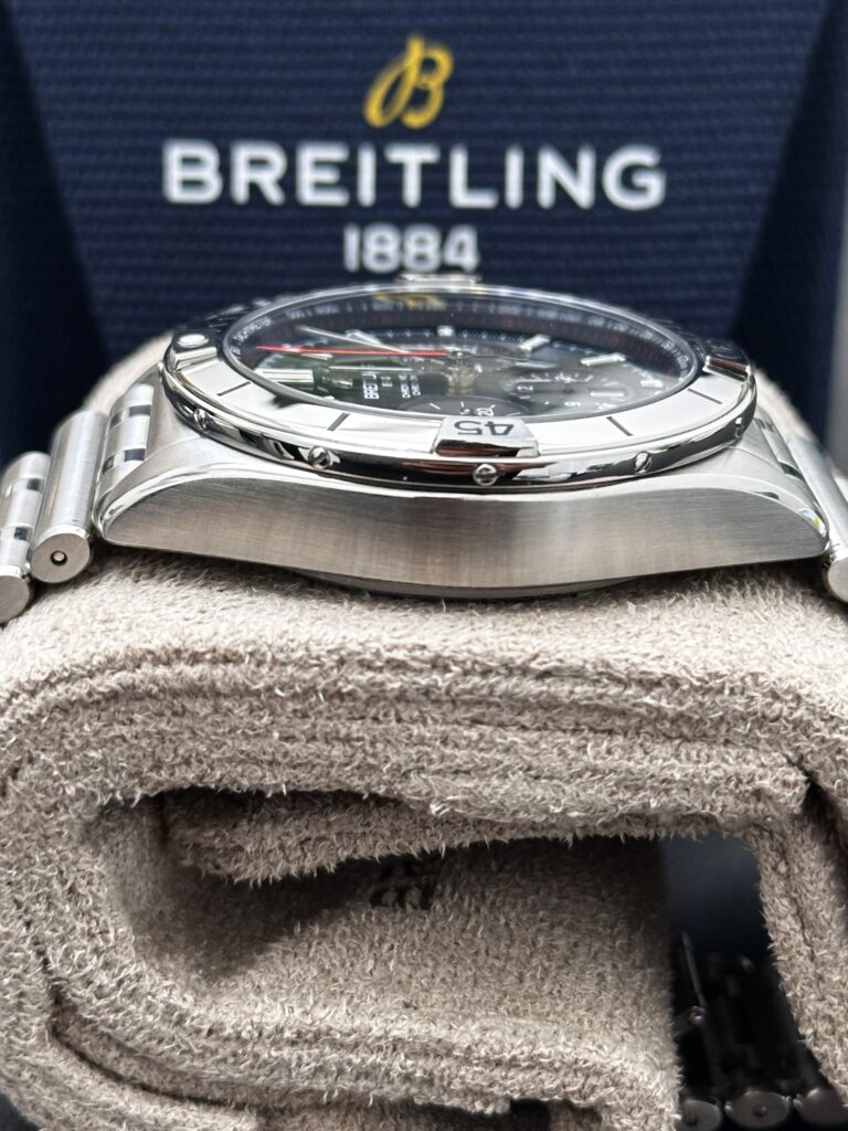 Breitling Chronomat green dial on presentation cushion